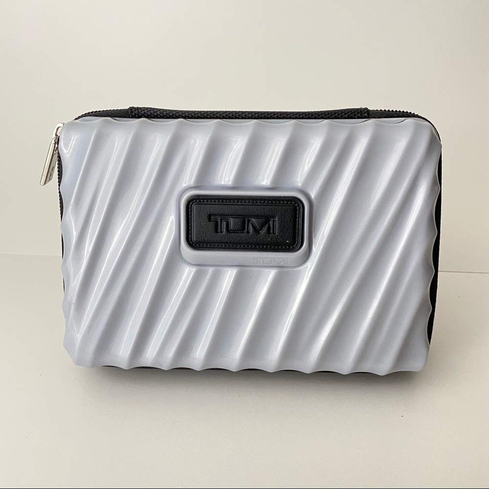 Tumi